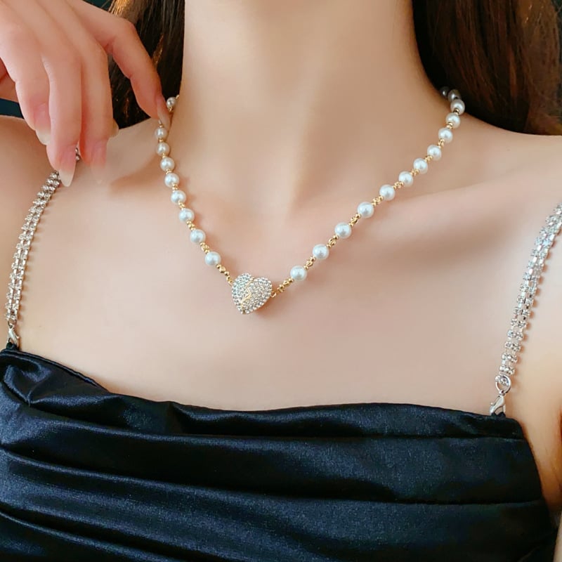 💖 Den perfekte gaven for kjærlighet og eleganse - Magnetisk hjerteperlekjede 💖