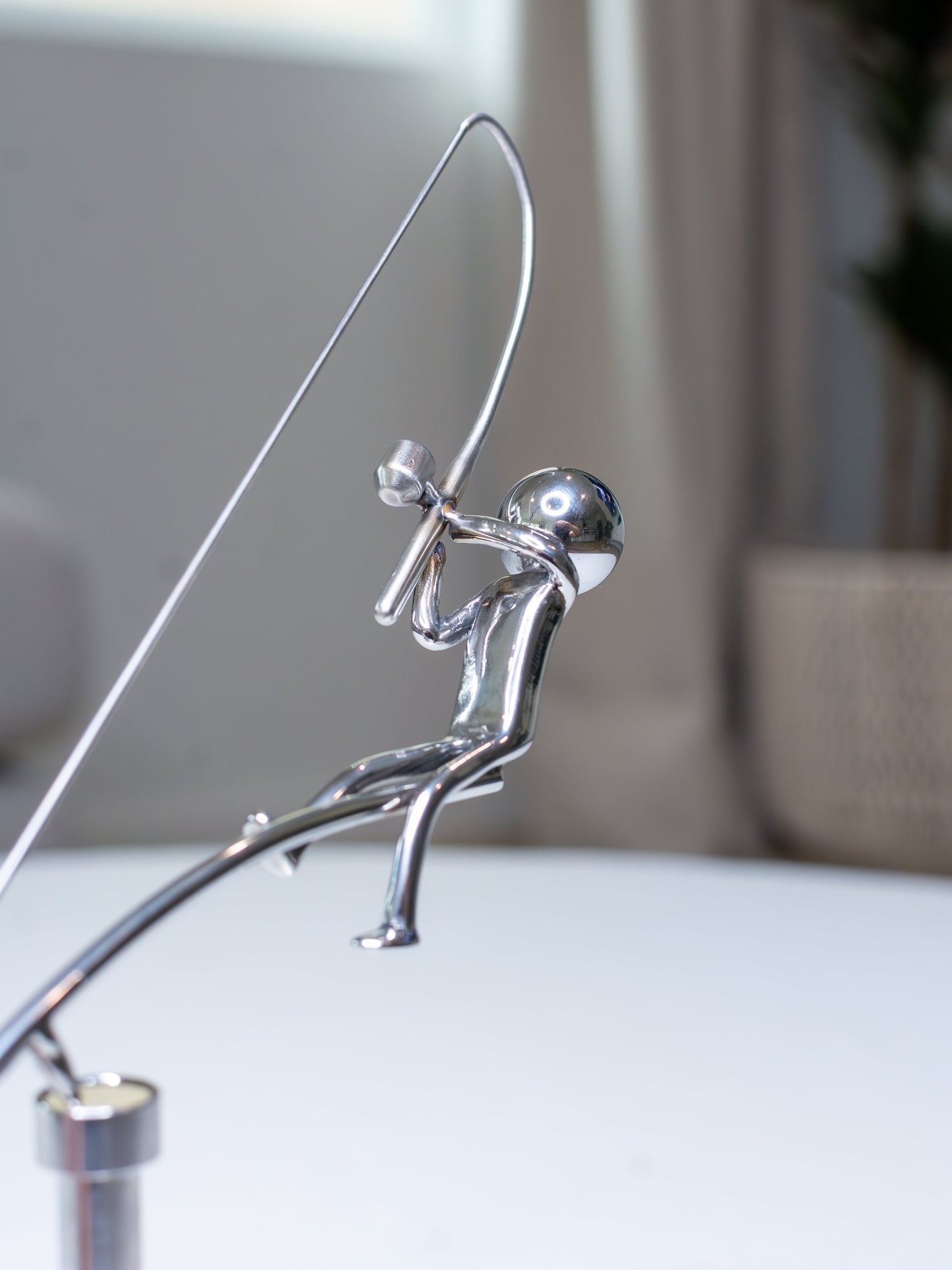 🎣Skulpturen med balanserende fisker