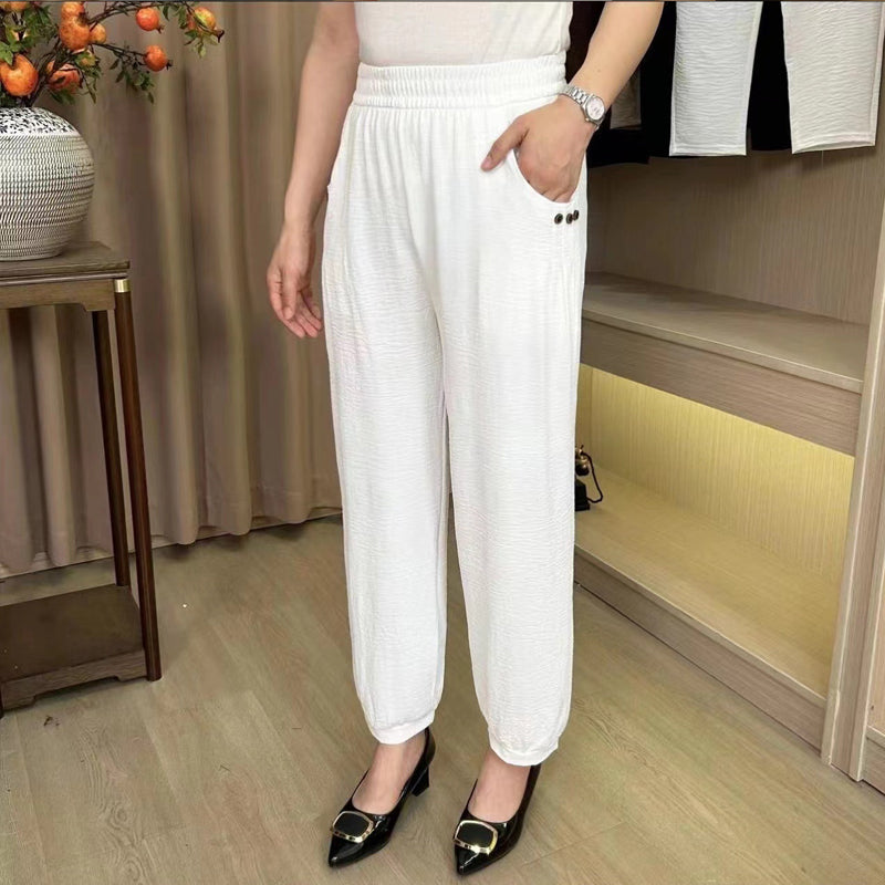 Haremsbukser med høy midje og nedadgående linning i isskinn