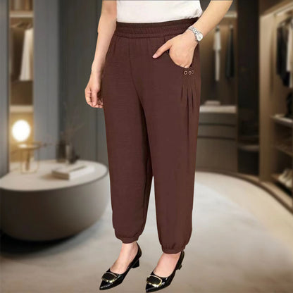 Haremsbukser med høy midje og nedadgående linning i isskinn