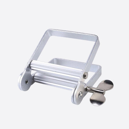 Multifunksjonell tannkrempresse i metall