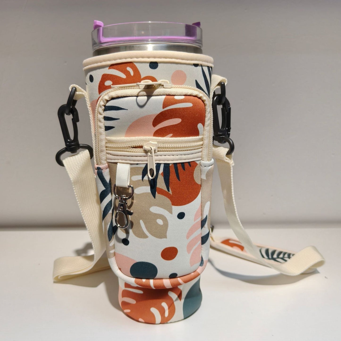 Justerbar skulderveske med termokoppholder for 40 oz