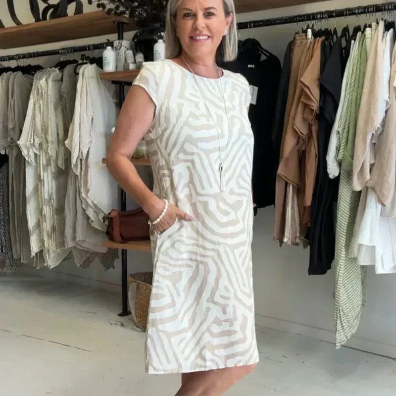 🌸 Sommerlig bohemsk blomsterkjole med rund utringning