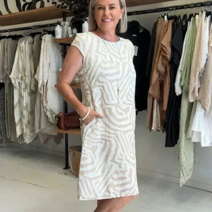 🌸 Sommerlig bohemsk blomsterkjole med rund utringning