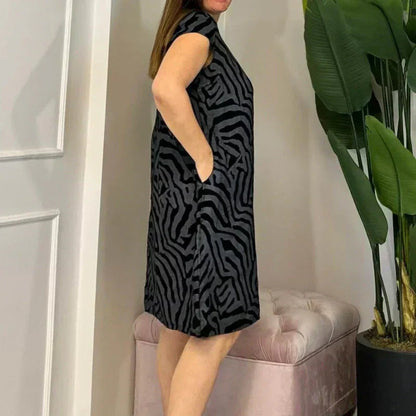 🌸 Sommerlig bohemsk blomsterkjole med rund utringning