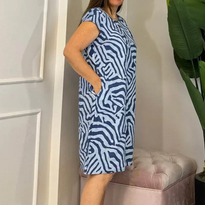 🌸 Sommerlig bohemsk blomsterkjole med rund utringning